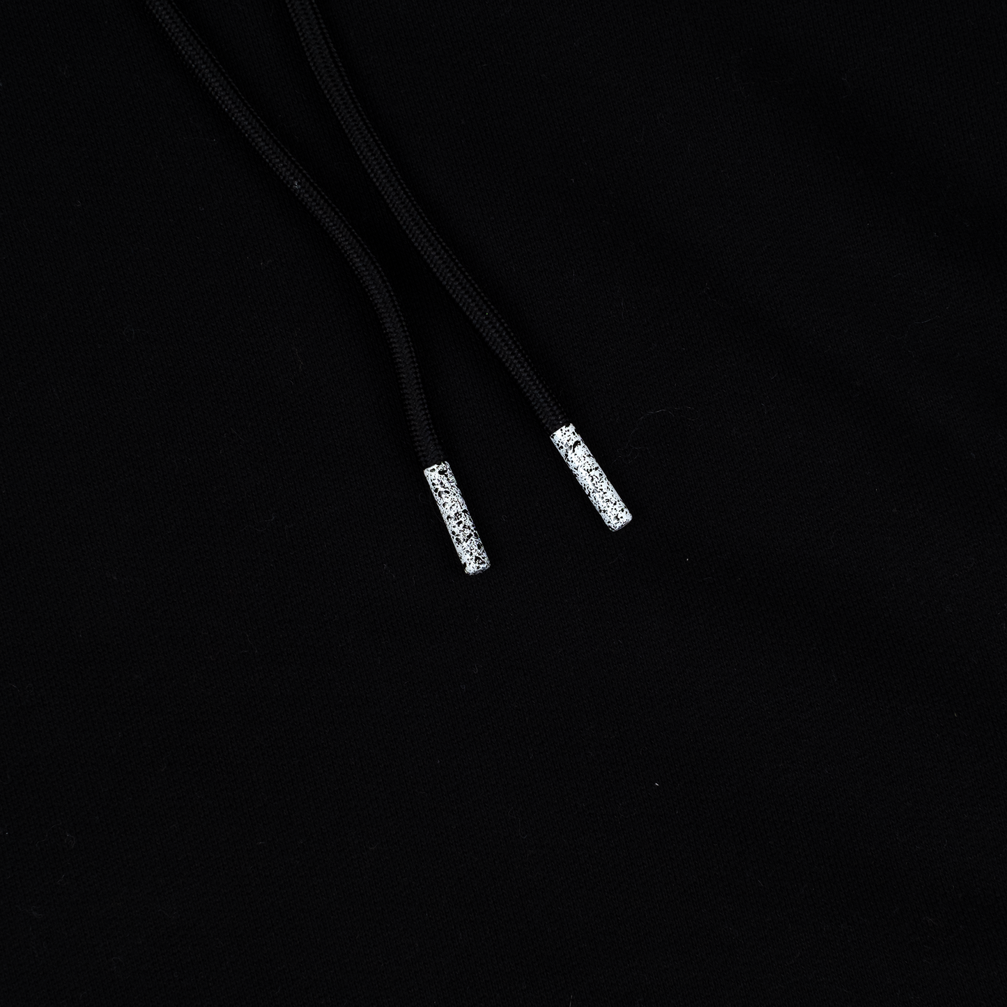 Solace Golf black hoody drawcord detail.